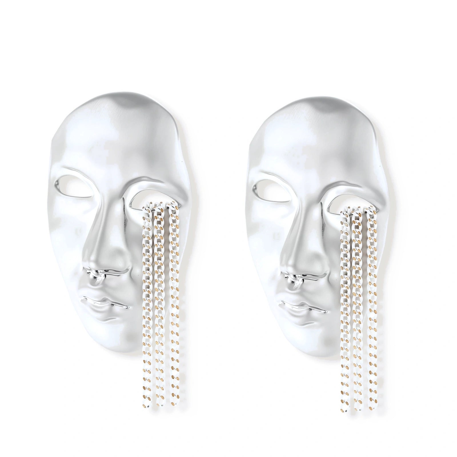 Silver face-shaped statement earrings with flowing chain tassels hanging from sculpted lips on cream background