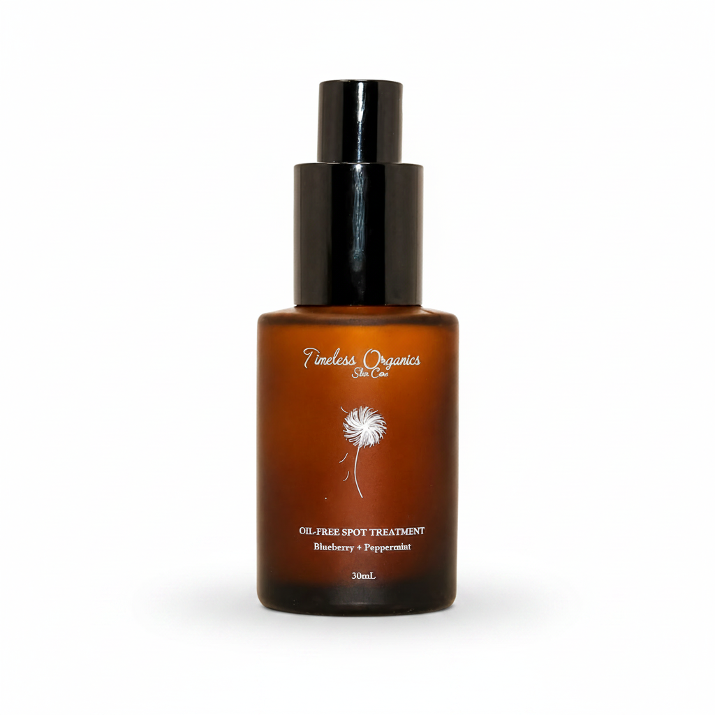 An amber glass bottle with a black pump dispenser, labeled 'Puerar Organic' and 'Oil-Free Spot Treatment', set against a warm beige background.