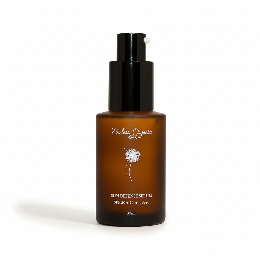 An amber glass pump bottle of Timless Organics Sun Tea Sun Defense Serum SPF 30 + Carrot Seed, set against a warm beige background with soft diagonal shadows.