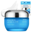 Blue skincare cream jar with silver lid and packaging on a white background