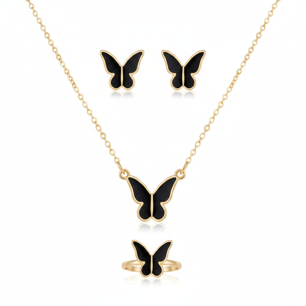 Butterfly necklace and earrings set on a white background