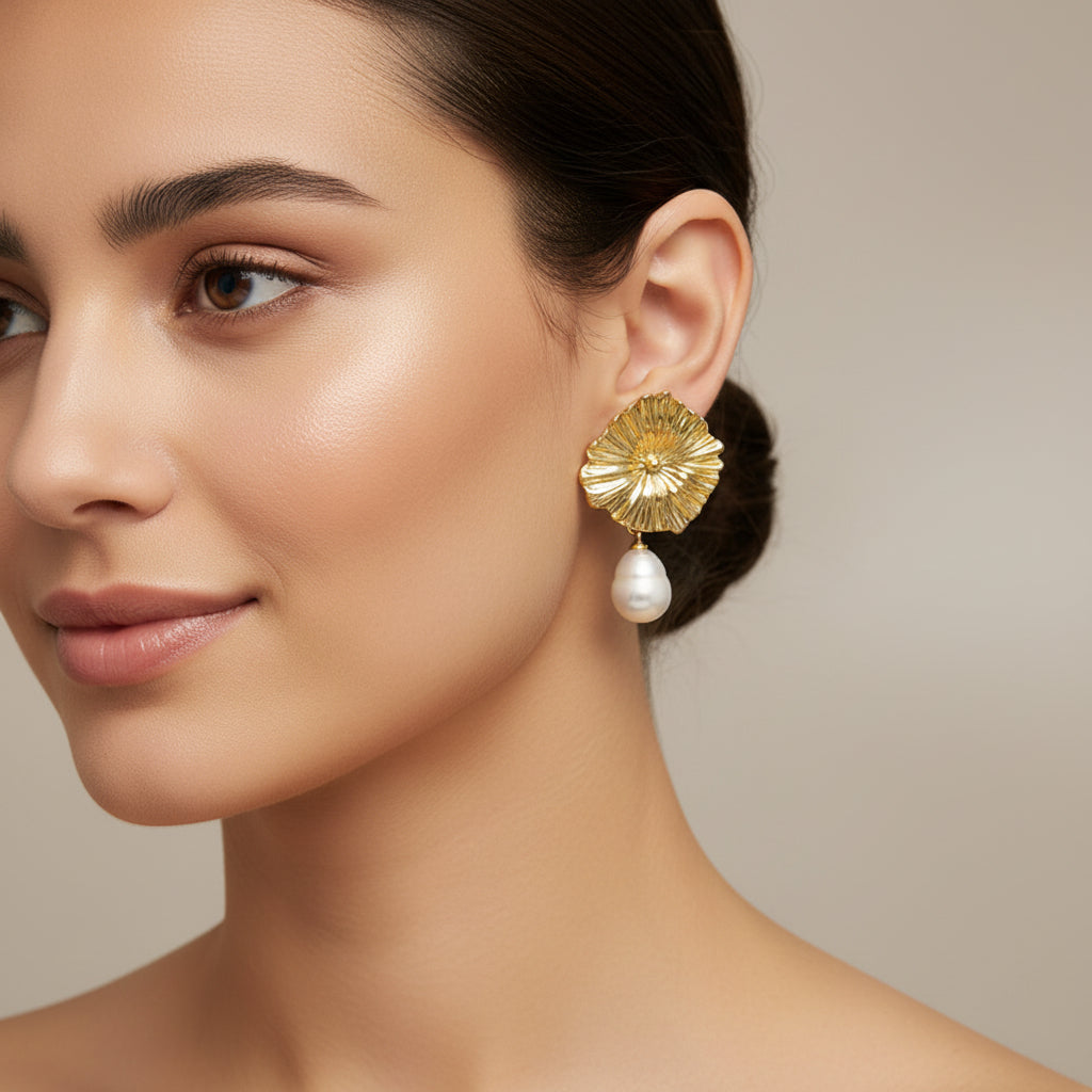 Gold floral earrings 
