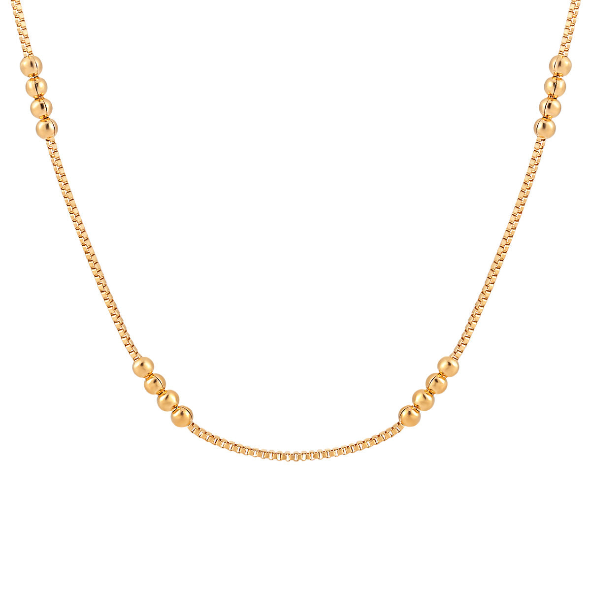 Gold necklace with beads on a white background