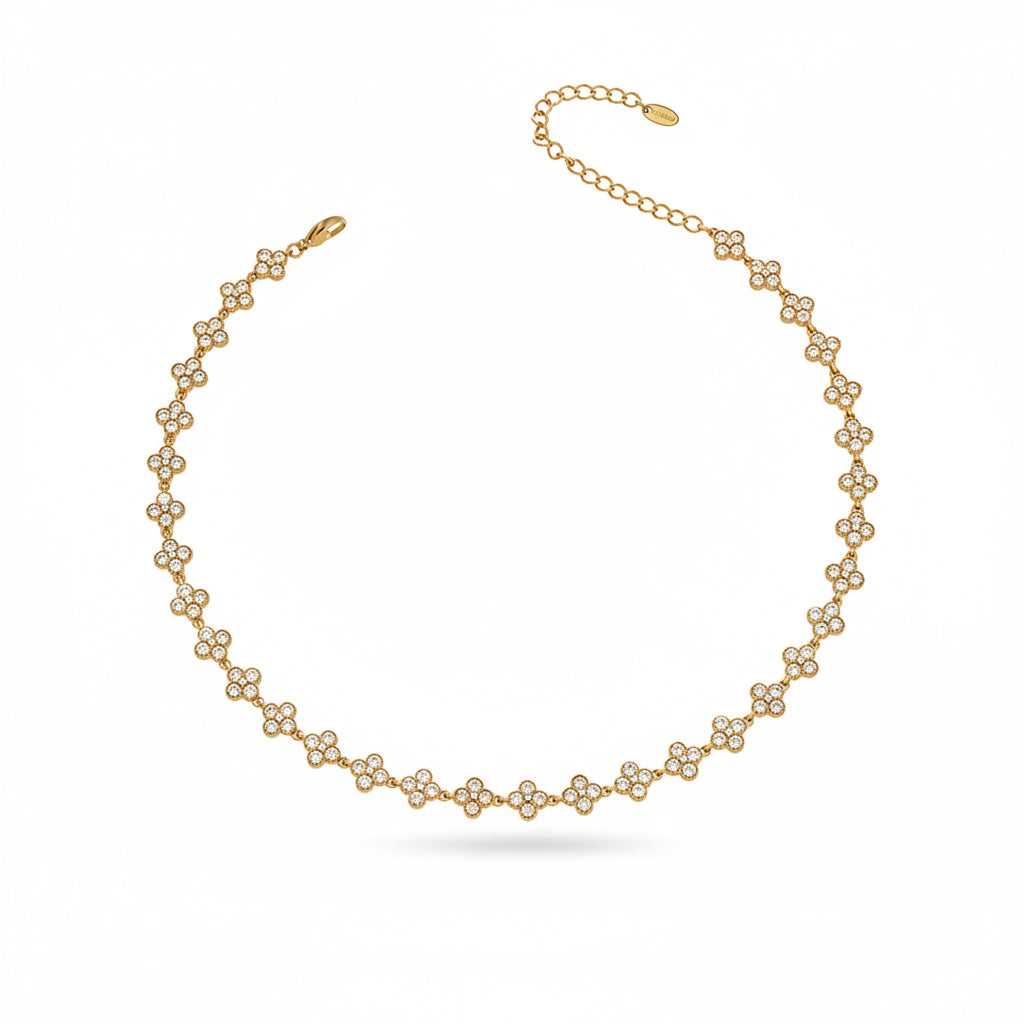 Gold necklace with measurements and material details on a white background