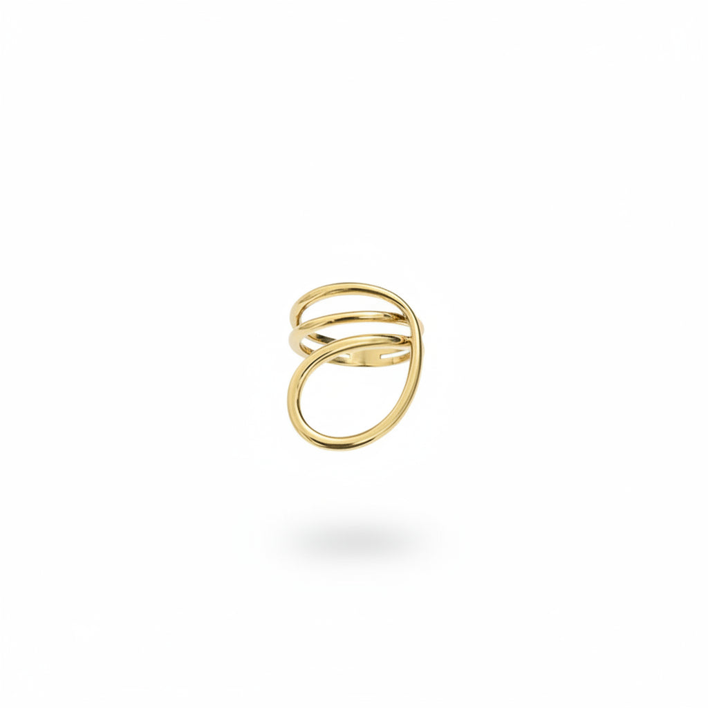 Hand wearing a gold ring on a black background