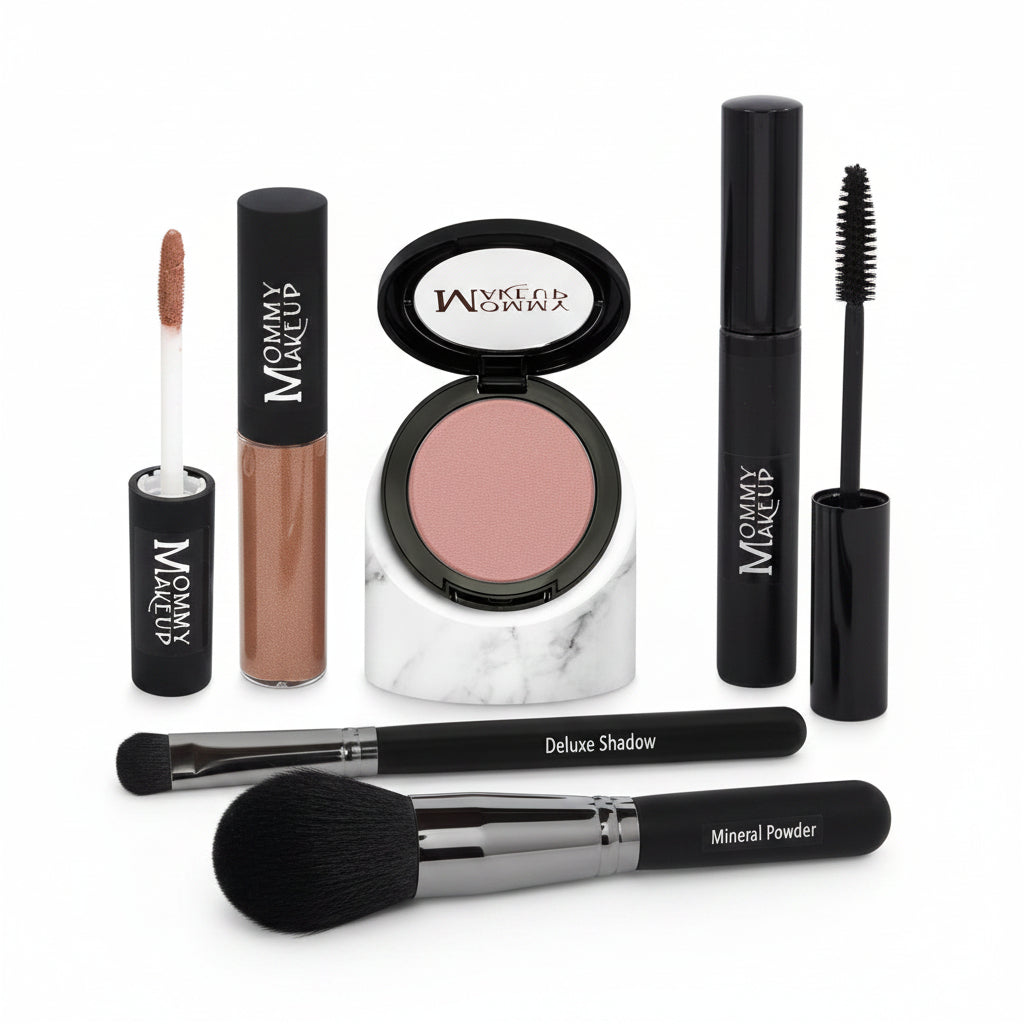Makeup products including blush, lip gloss, and brushes with 'Mommy Makeup' branding on a marble surface.