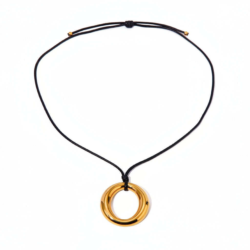 Necklace with a gold pendant on a black cord, showing weight, length, and dimensions.