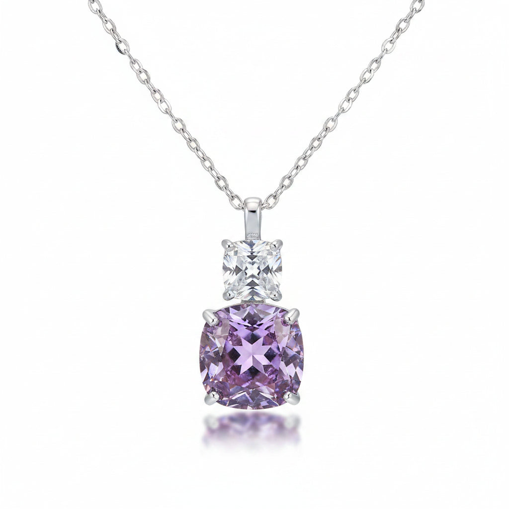 Necklace with a purple and clear pendant 