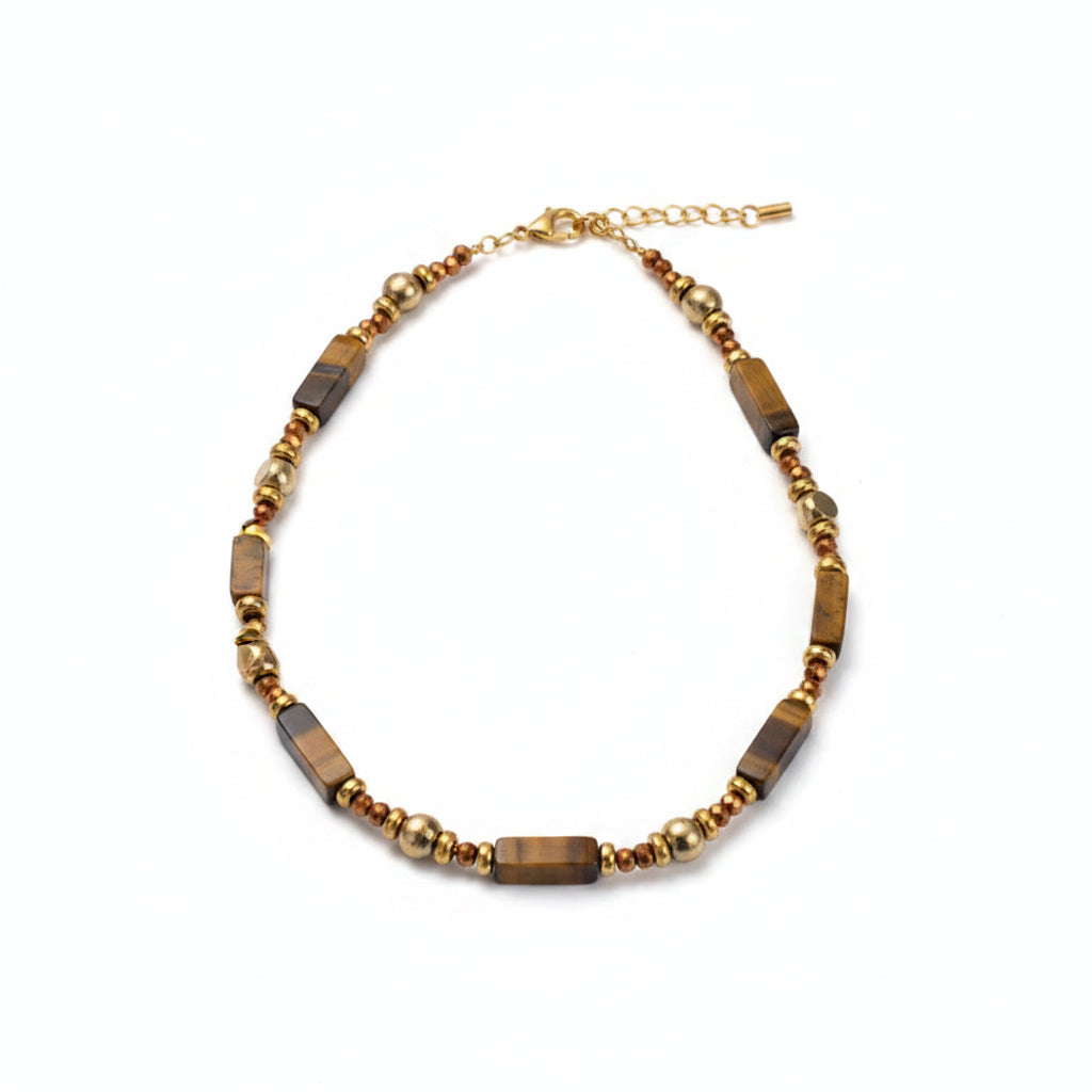 Necklace with beads on a textured surface