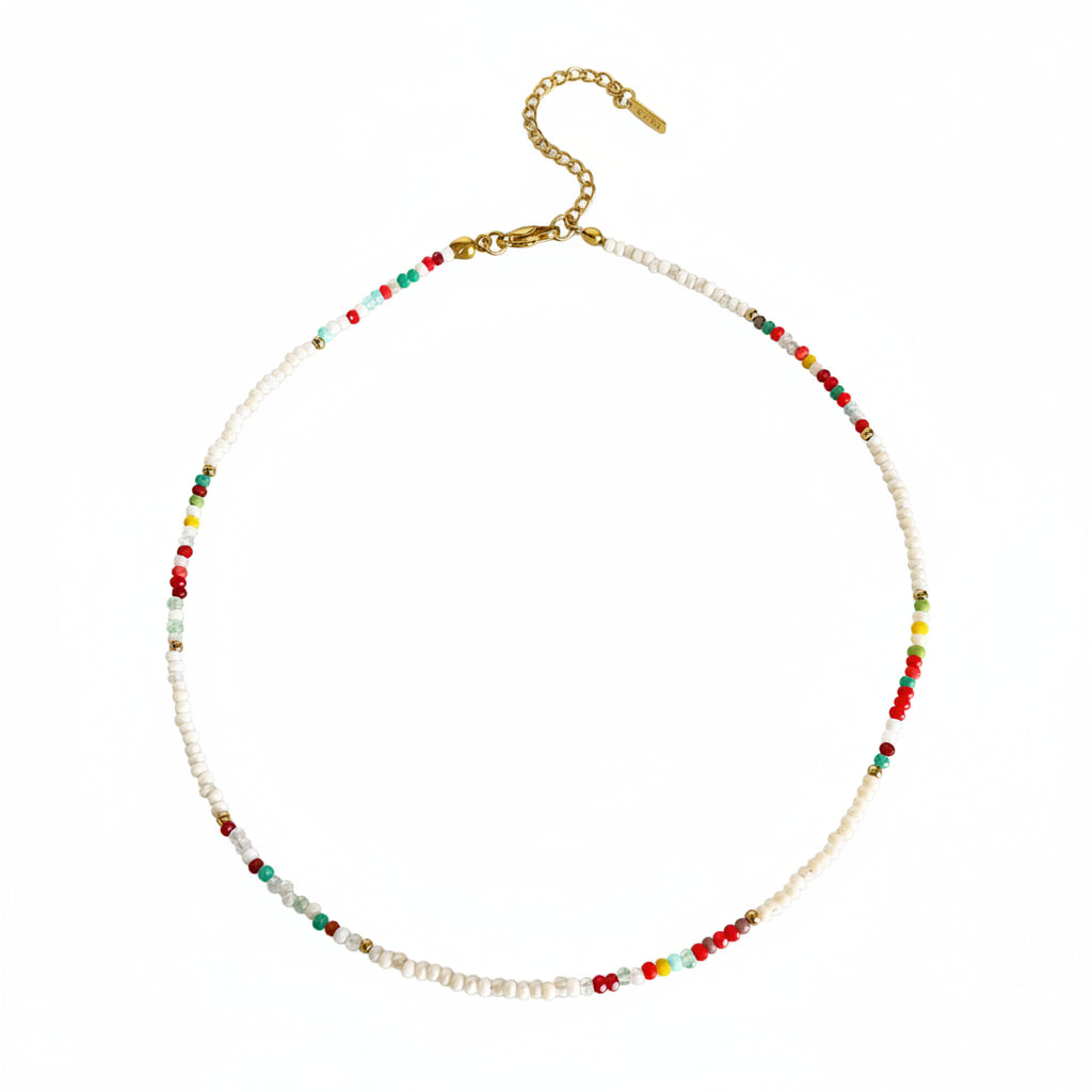 Necklace with colorful beads on a beige background