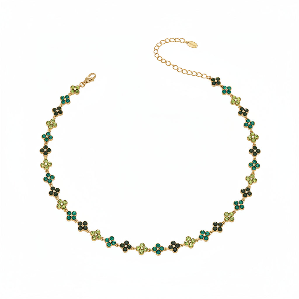 Necklace with green and gold beads and buttons, labeled with measurements and material details.