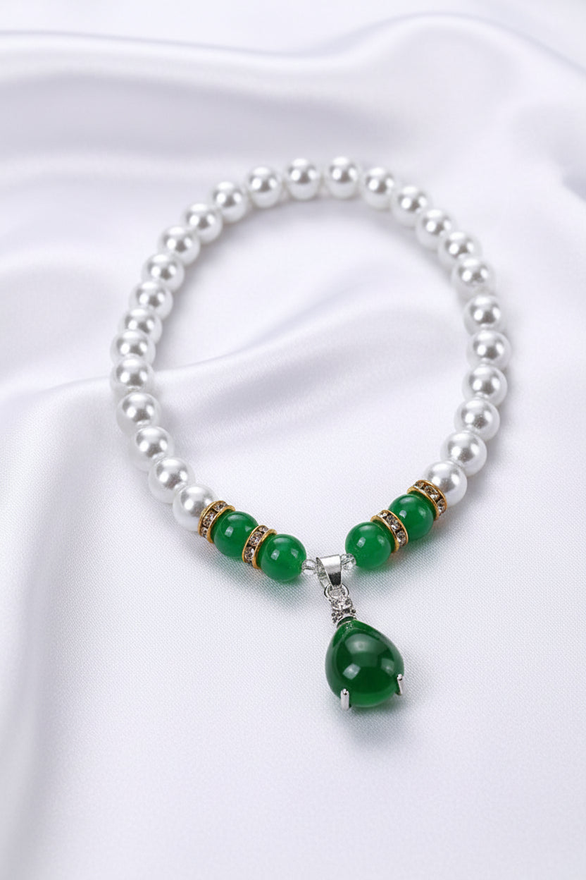 Pearl and green bead necklace with a teardrop pendant 