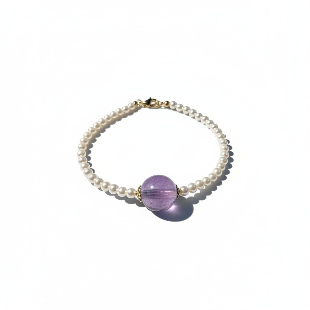 Pearl bracalet with purple beads 
