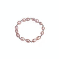 Pearl bracelet on a beige background
