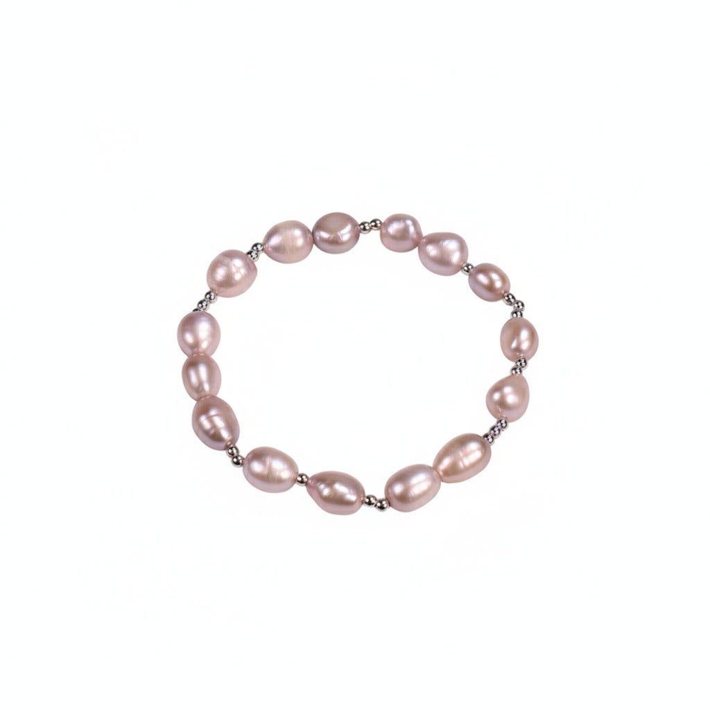 Pearl bracelet on a beige background