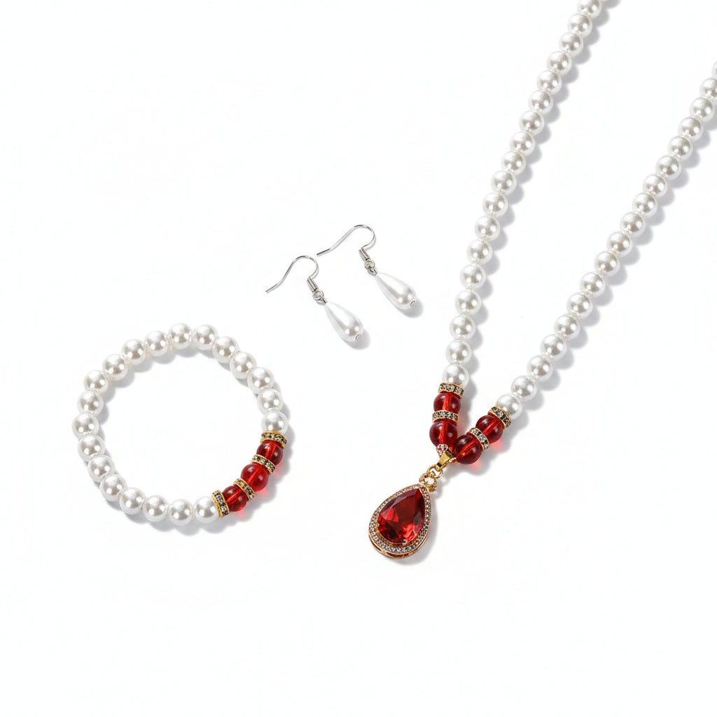 Pearl jewelry set with red accents 