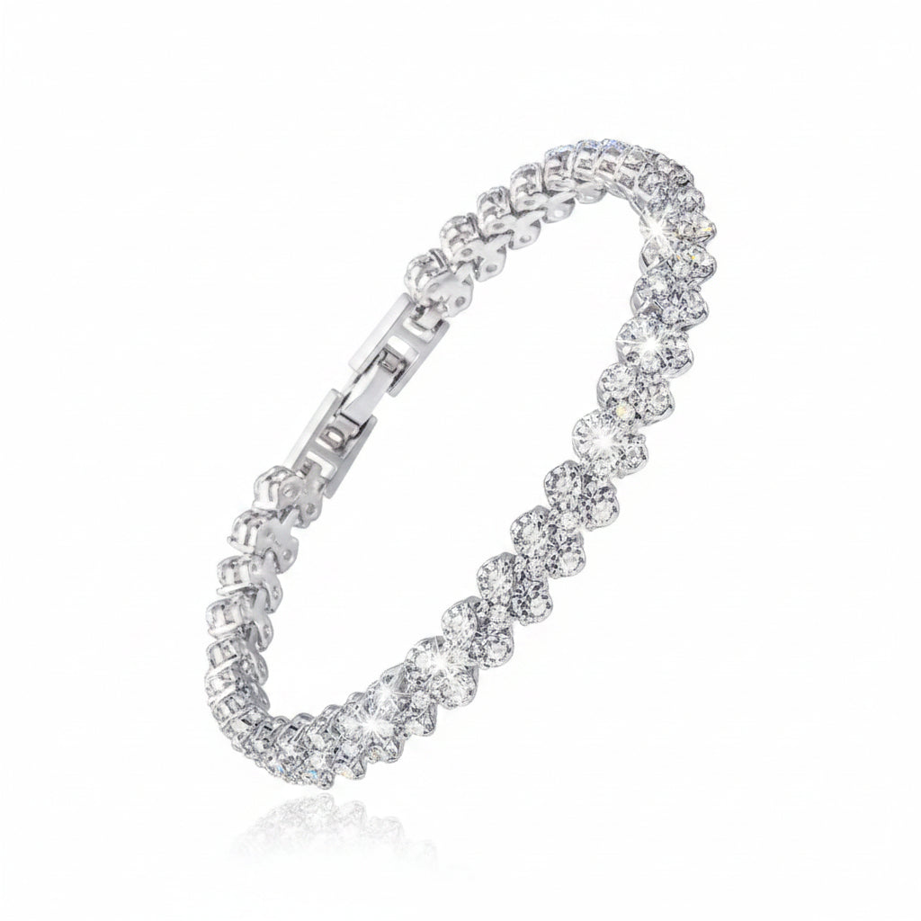 Silver bracelet with clear stones on a blurred background