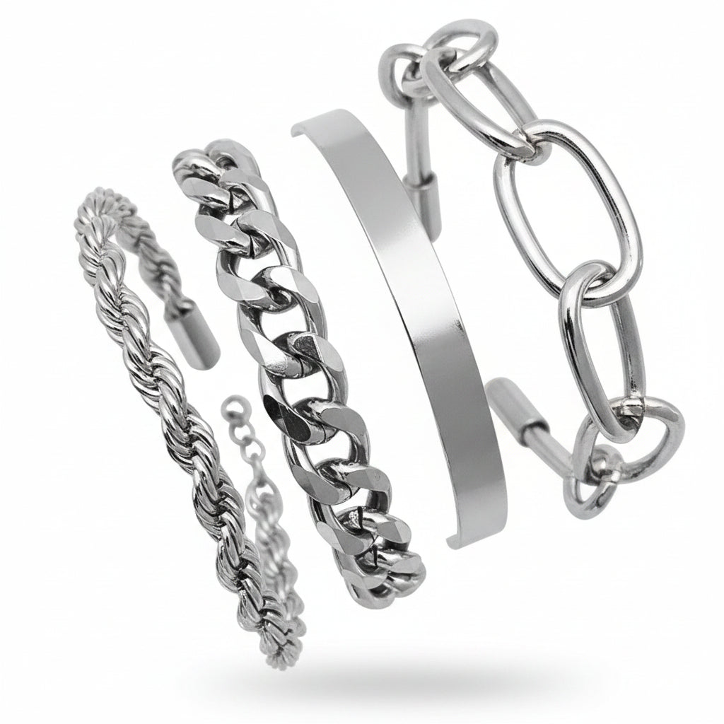 Silver bracelets on a wrist against a white background