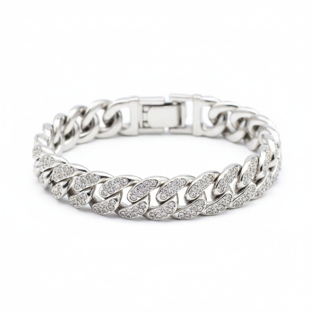 Silver chain bracelet with clear stones on a black background