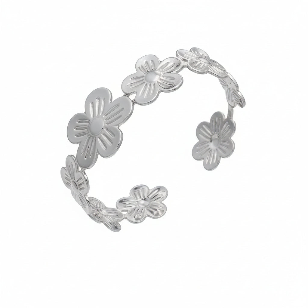 Silver floral bracelet with measurements and product details on a white background