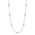 Silver necklace with pearls on a white background