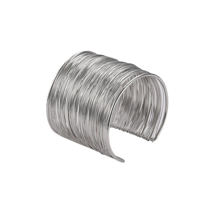 Silver wire bracelet on a white background