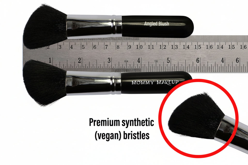 Two makeup brushes with 'Mommy Makeup' branding, one with a ruler for size reference, and text highlighting vegan synthetic bristles.