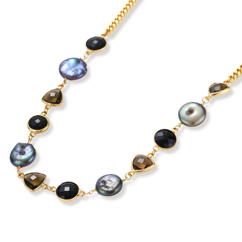 18k gold-plated chain necklace featuring lustrous baroque pearls, black onyx rounds, and smoky quartz triangular stones on white background.