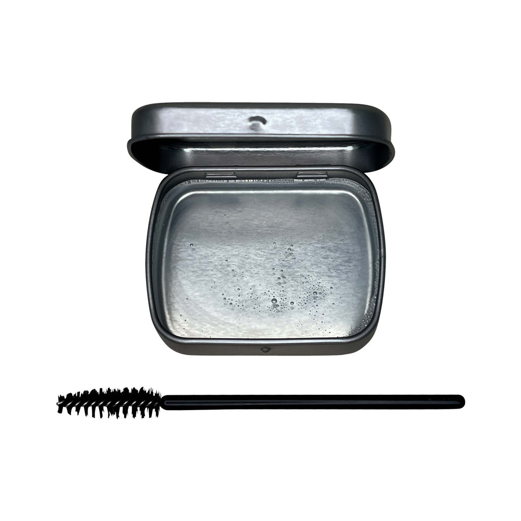 Linda's Look Brow Soap in Clear, clear brow soap shown open with the applicator stick