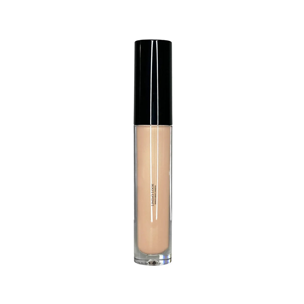 Linda's Look Concealing Cream in Custard, full coverage liquid concealer tube with doe-foot applicator, front view on white background