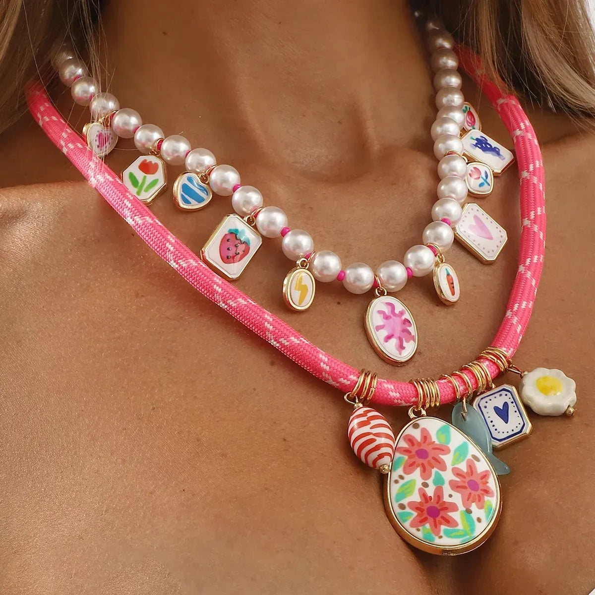 Linda's Look Sunset Cove Charm Necklace - Painted Heart, Flower and Pearl Multi-Pendant