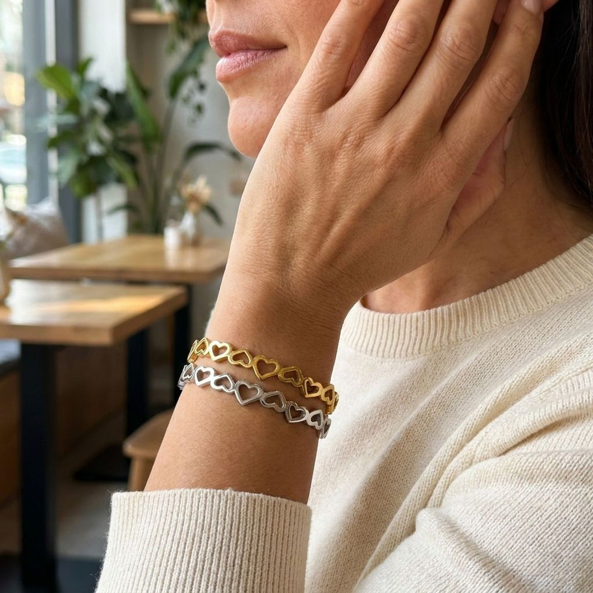 Women's Hollow Heart Stainless Steel Bracelet - Gold & Steel Finish — lifestyle